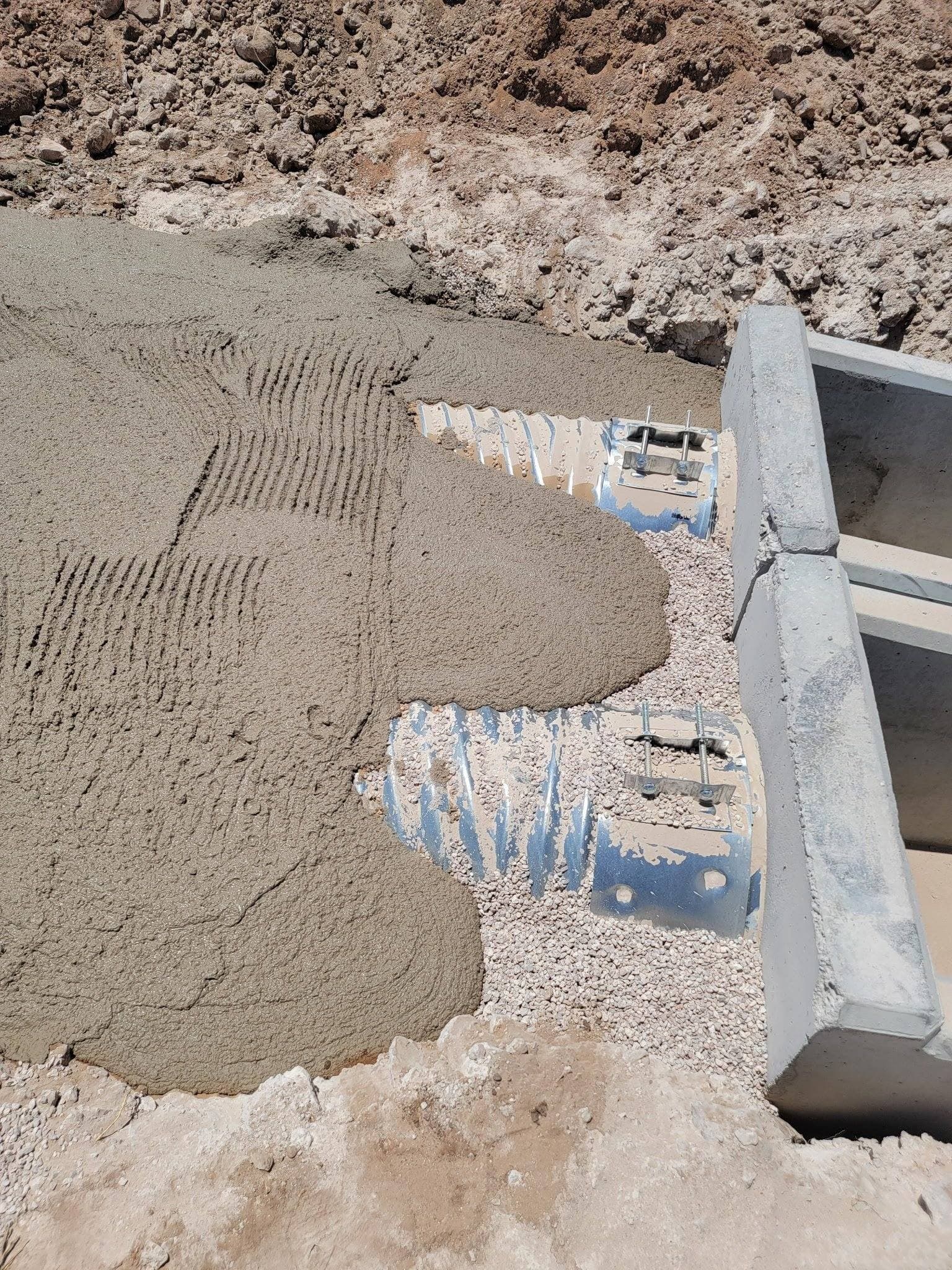 Pouring a concrete headwall for a culvert