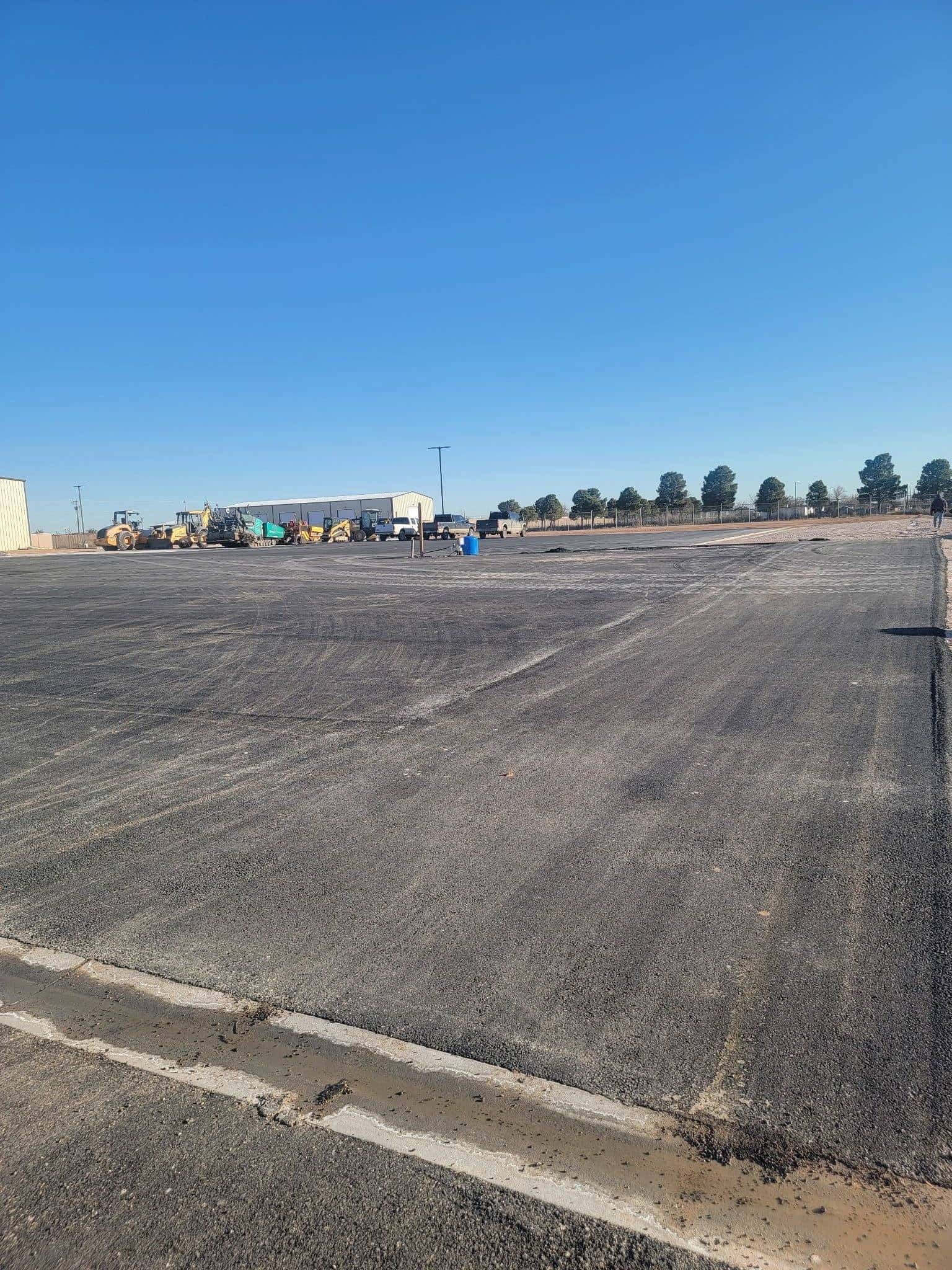 Graded commercial site with the building pad shaped and compacted in Midland, Texas