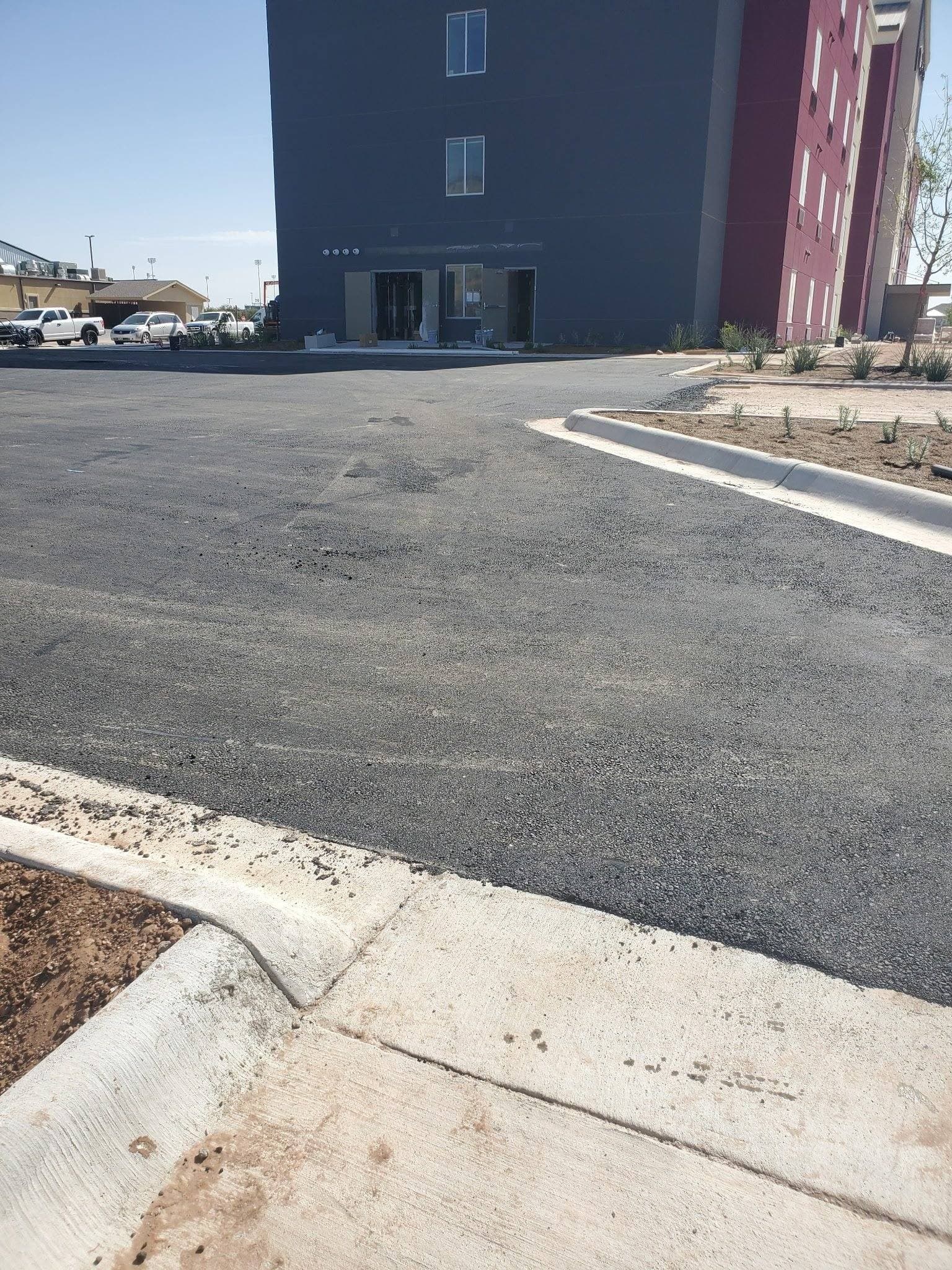 Paved commercial lot with finished curb
